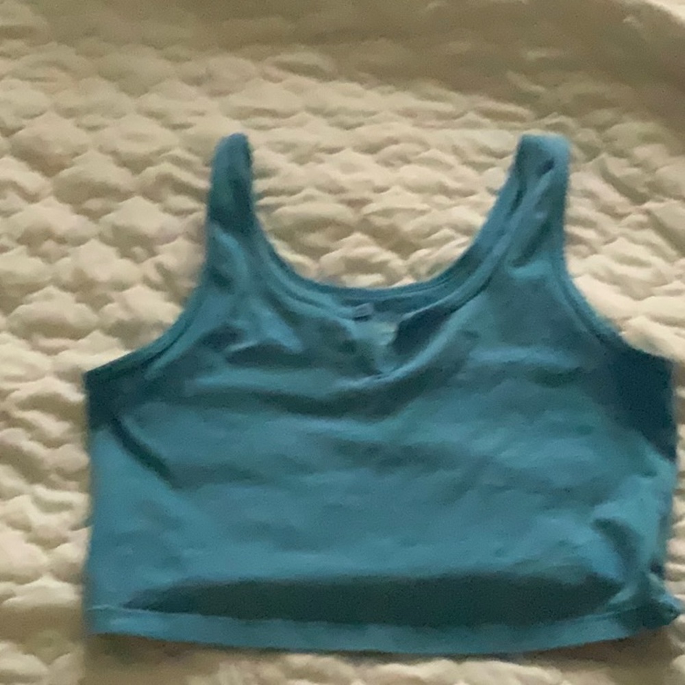 i am selling a blue cropped shirt.